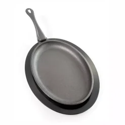 Gusseisenpfanne mit Kunststoffuntersetzer Pfanne